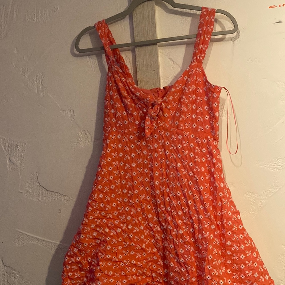 Blue rain pink floral dress with tie up detail.